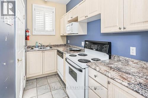 314 - 1451 Walker'S Line, Burlington, ON - Indoor Photo Showing Kitchen With Double Sink