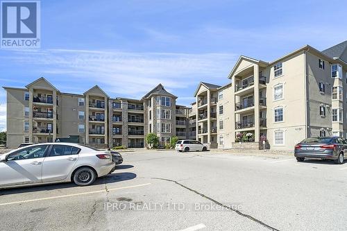 314 - 1451 Walker'S Line, Burlington, ON - Outdoor With Facade