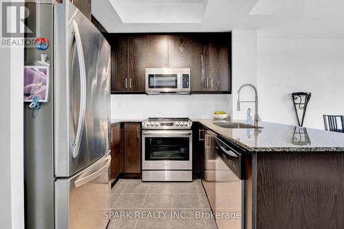 1018 - 15 James Finlay Way, Toronto (Downsview-Roding-Cfb), ON - Indoor Photo Showing Kitchen With Stainless Steel Kitchen With Upgraded Kitchen