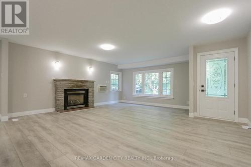 24 Parkside Avenue, South Bruce Peninsula, ON - Indoor Photo Showing Living Room With Fireplace