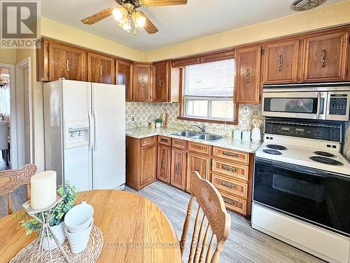 15 Nashland Avenue, Toronto (Princess-Rosethorn), ON - Indoor Photo Showing Kitchen With Double Sink