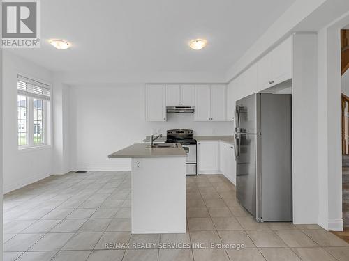 66 Stately Drive, Wasaga Beach, ON - Indoor Photo Showing Kitchen With Double Sink