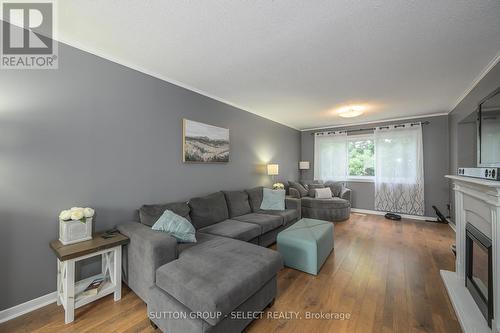 34 - 734 Wilkins Street, London, ON - Indoor Photo Showing Living Room With Fireplace