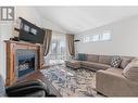 374 Trumpeter Court, Kelowna, BC  - Indoor Photo Showing Living Room With Fireplace 