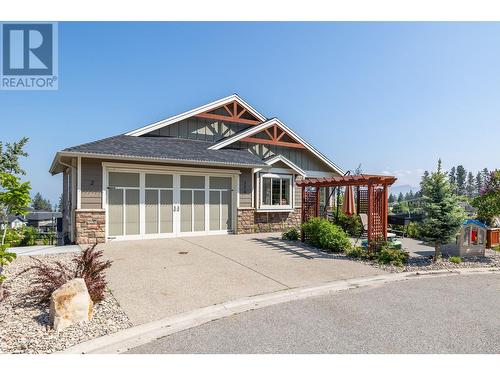 374 Trumpeter Court, Kelowna, BC - Outdoor With Facade