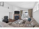 374 Trumpeter Court, Kelowna, BC  - Indoor Photo Showing Living Room With Fireplace 