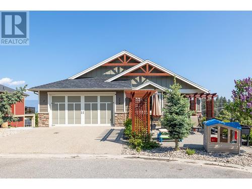 374 Trumpeter Court, Kelowna, BC - Outdoor With Facade