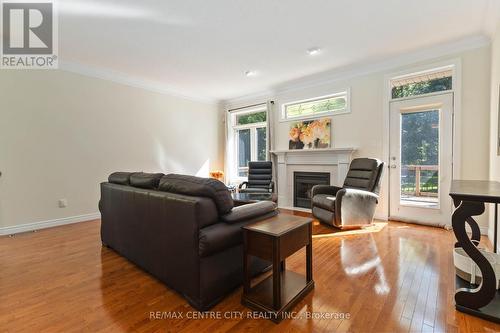 17 - 44 Edgevalley Road, London, ON - Indoor Photo Showing Living Room With Fireplace