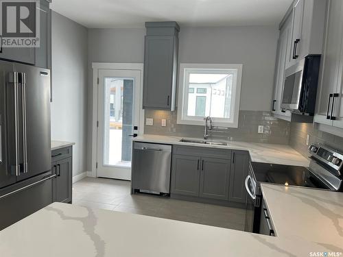 154 Mazurek Crescent, Saskatoon, SK - Indoor Photo Showing Kitchen With Stainless Steel Kitchen With Double Sink