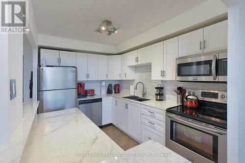 606 - 2301 Derry Road W, Mississauga (Meadowvale), ON - Indoor Photo Showing Kitchen With Stainless Steel Kitchen With Double Sink