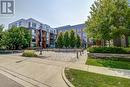 211 - 150 Sabina Drive, Oakville, ON  - Outdoor With Facade 