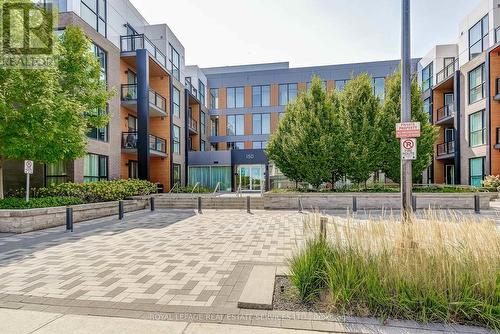 211 - 150 Sabina Drive, Oakville, ON - Outdoor With Facade