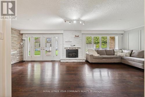 80 Princess Margaret Boulevard, Toronto (Princess-Rosethorn), ON - Indoor Photo Showing Living Room With Fireplace