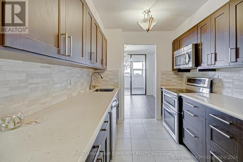 1215 - 75 Emmett Avenue, Toronto (Mount Dennis), ON - Indoor Photo Showing Kitchen With Upgraded Kitchen