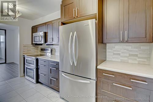 1215 - 75 Emmett Avenue, Toronto (Mount Dennis), ON - Indoor Photo Showing Kitchen