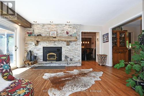 S10755 Sideroad 17, Brock (Sunderland), ON - Indoor Photo Showing Living Room With Fireplace