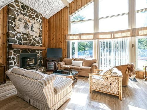 Salon - 656 Ch. Des Bouleaux, Piedmont, QC - Indoor Photo Showing Living Room With Fireplace