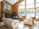 Salon - 656 Ch. Des Bouleaux, Piedmont, QC  - Indoor Photo Showing Living Room With Fireplace 