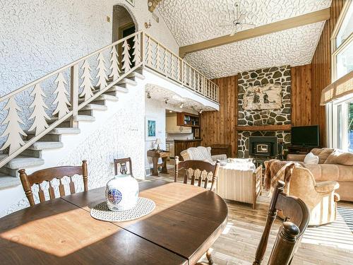 Dining room - 656 Ch. Des Bouleaux, Piedmont, QC - Indoor Photo Showing Dining Room With Fireplace