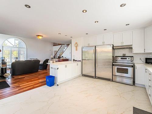 Kitchen - 46 Rue Du Roitelet, Orford, QC - Indoor Photo Showing Living Room With Fireplace