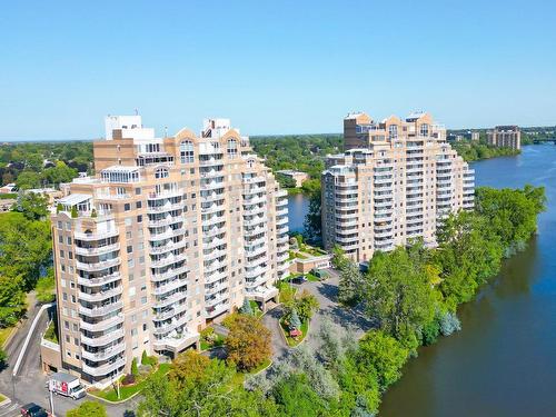 Photo aÃ©rienne - 203-520 Place Juge-Desnoyers, Laval (Pont-Viau), QC - Outdoor With Body Of Water