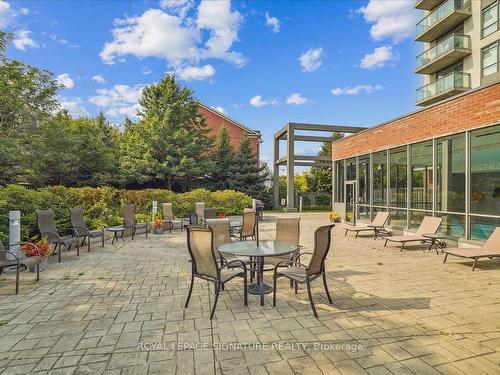 218-120 Dallimore Circ, Toronto, ON - Outdoor With Deck Patio Veranda