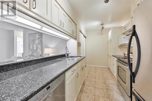 418 - 20 Southport Street, Toronto (High Park-Swansea), ON - Indoor Photo Showing Kitchen With Double Sink