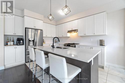 28 Freedom Crescent, Hamilton (Mount Hope), ON - Indoor Photo Showing Kitchen With Double Sink With Upgraded Kitchen