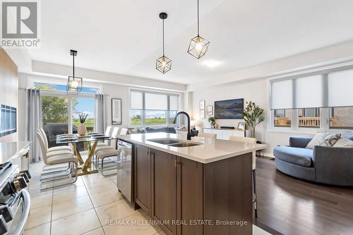 28 Freedom Crescent, Hamilton (Mount Hope), ON - Indoor Photo Showing Kitchen With Double Sink With Upgraded Kitchen