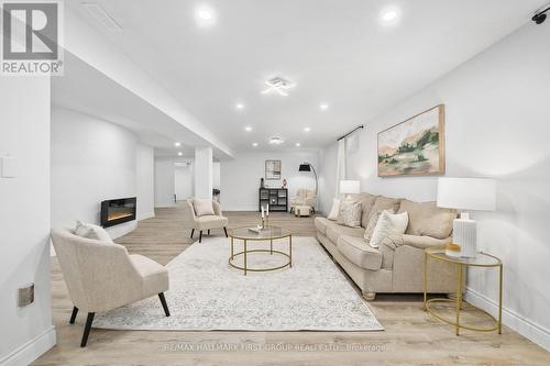 10 Meadow Drive, Kawartha Lakes, ON - Indoor Photo Showing Living Room With Fireplace