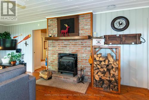 130 Driftwood Village Drive, Kawartha Lakes, ON - Indoor Photo Showing Living Room With Fireplace