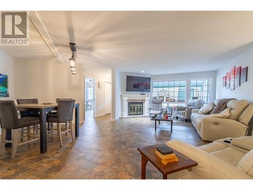 805 Comox Street Unit# 143, Penticton, BC - Indoor Photo Showing Living Room With Fireplace