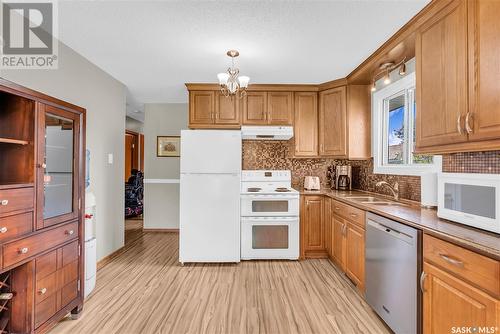 2714 Louise Street, Saskatoon, SK - Indoor Photo Showing Kitchen With Double Sink