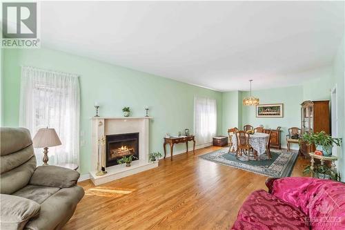 1075 Normandy Crescent, Ottawa, ON - Indoor Photo Showing Living Room With Fireplace