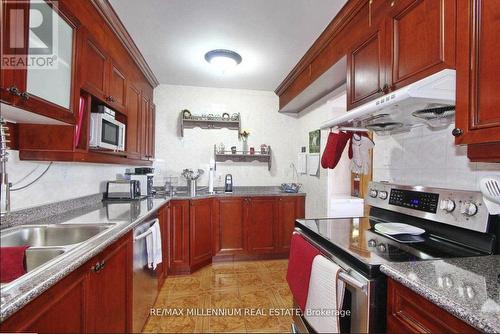 510 - 2835 Islington Avenue, Toronto (Humber Summit), ON - Indoor Photo Showing Kitchen With Double Sink