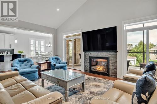 103 South Harbour Drive, Kawartha Lakes (Bobcaygeon), ON - Indoor Photo Showing Living Room With Fireplace