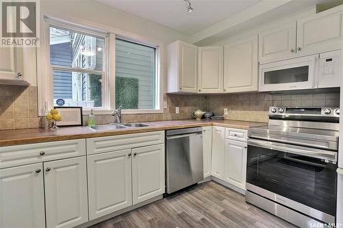 2058 Robinson Street, Regina, SK - Indoor Photo Showing Kitchen With Double Sink