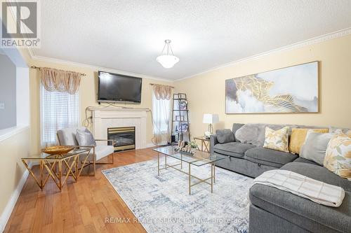 38 Sams Crescent, Brampton (Fletcher'S Meadow), ON - Indoor Photo Showing Living Room With Fireplace