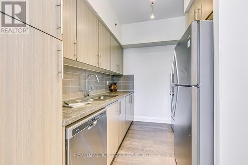 205 - 65 Speers Road, Oakville, ON - Indoor Photo Showing Kitchen With Double Sink