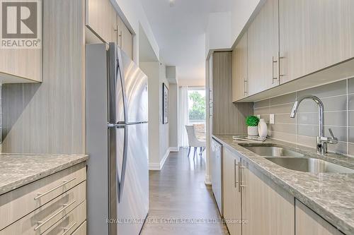 205 - 65 Speers Road, Oakville (Old Oakville), ON - Indoor Photo Showing Kitchen With Double Sink