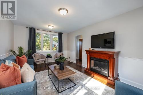 27 Jane Street, Clarington (Bowmanville), ON - Indoor Photo Showing Living Room With Fireplace