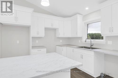 111 Wellington Street, Madoc, ON - Indoor Photo Showing Kitchen With Double Sink