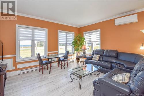 703 Acadie Street, Grande-Anse, NB - Indoor Photo Showing Living Room With Fireplace