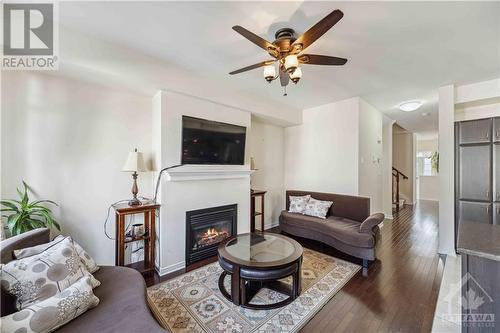 341 Sweetflag Street, Ottawa, ON - Indoor Photo Showing Living Room With Fireplace