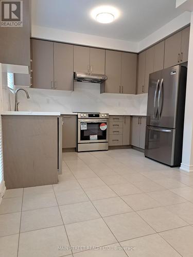 7 Roy Grove Way, Markham, ON - Indoor Photo Showing Kitchen With Stainless Steel Kitchen