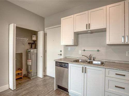 205-1847 Dufferin Cres, Nanaimo, BC - Indoor Photo Showing Kitchen With Double Sink