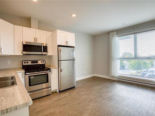 205-1847 Dufferin Cres, Nanaimo, BC - Indoor Photo Showing Kitchen With Stainless Steel Kitchen With Double Sink