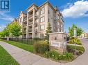 414 - 1440 Main Street E, Milton (Dempsey), ON  - Outdoor With Balcony With Facade 