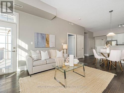 414 - 1440 Main Street E, Milton (Dempsey), ON - Indoor Photo Showing Living Room