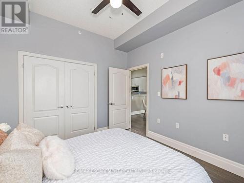 414 - 1440 Main Street E, Milton (Dempsey), ON - Indoor Photo Showing Bedroom